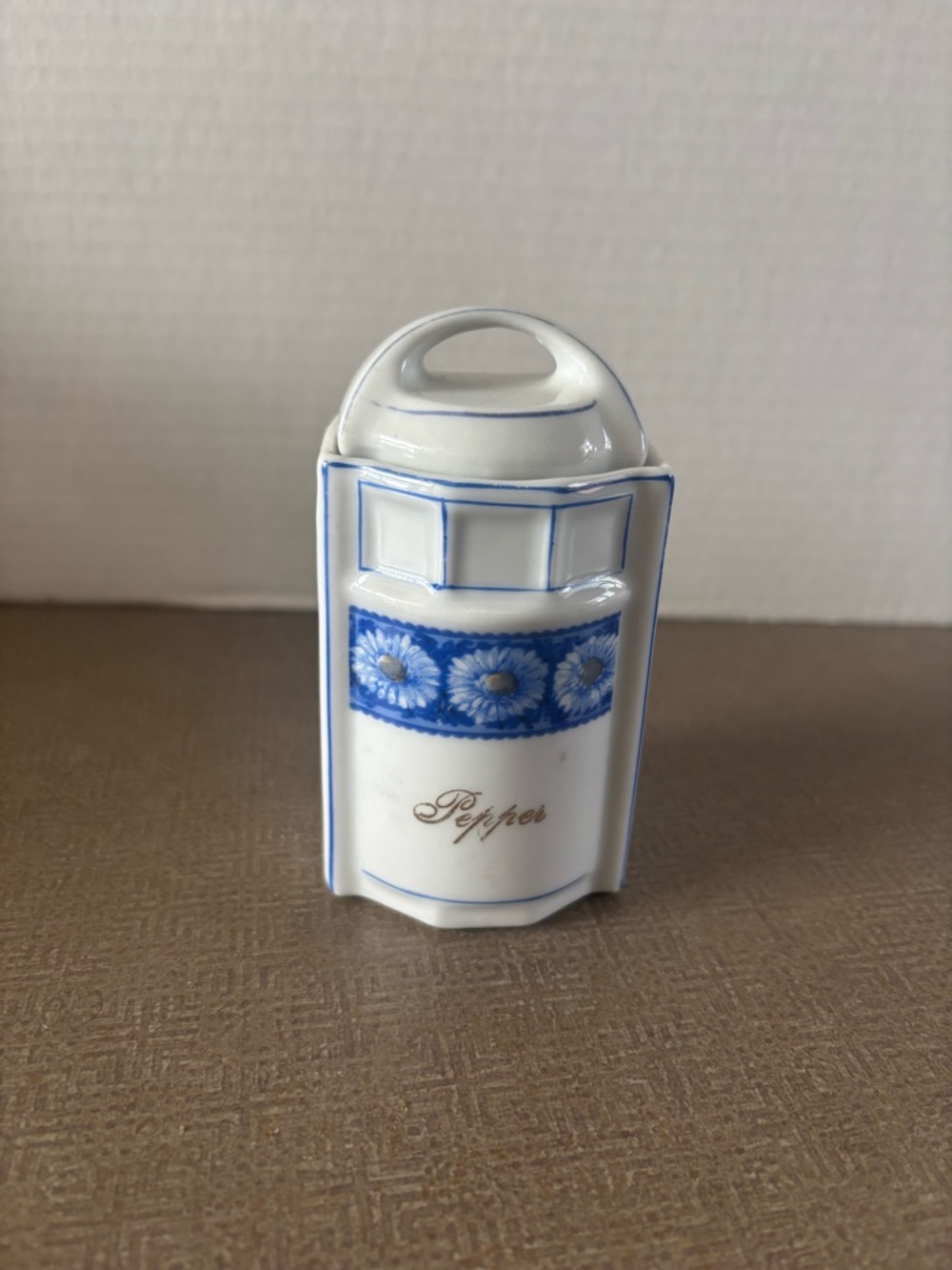 White Porcelain Pepper Shaker with Blue Floral Band